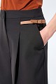 Pleated trousers with tabs