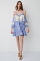 Vestido mini estampado con detalles de flecos y volantes